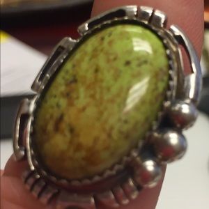 Serpentine Yellow Green oval stone in silver ring